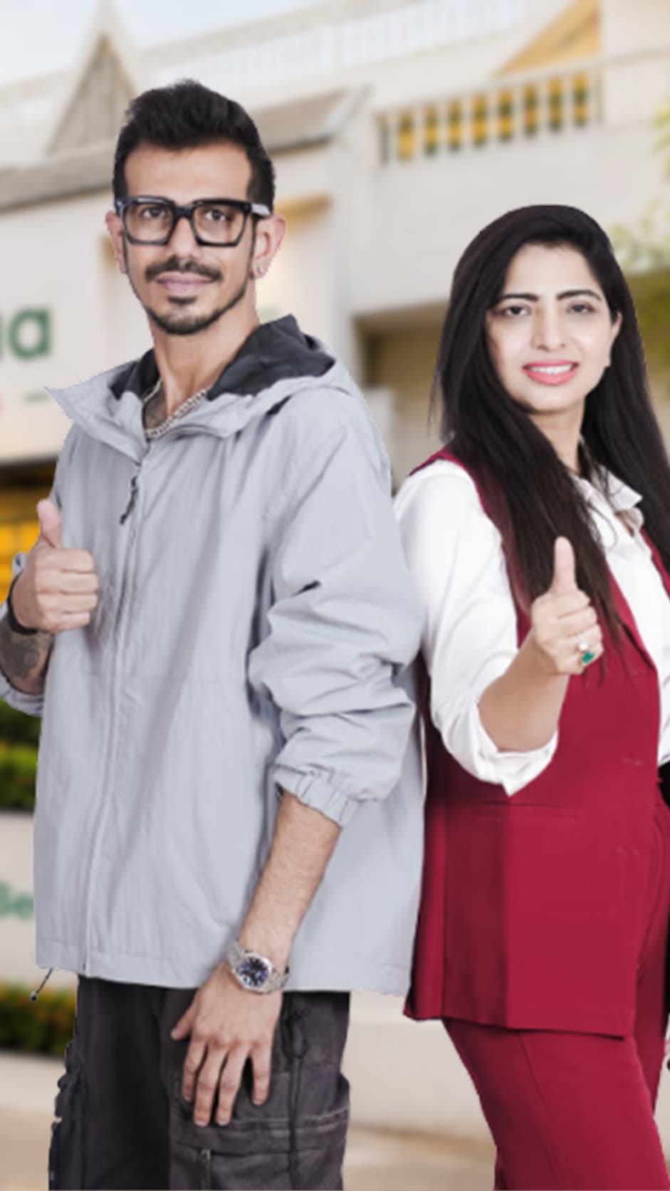 Yuzvendra Chahal and a colleague giving a thumbs-up outside a Kalpaa Early Years centre