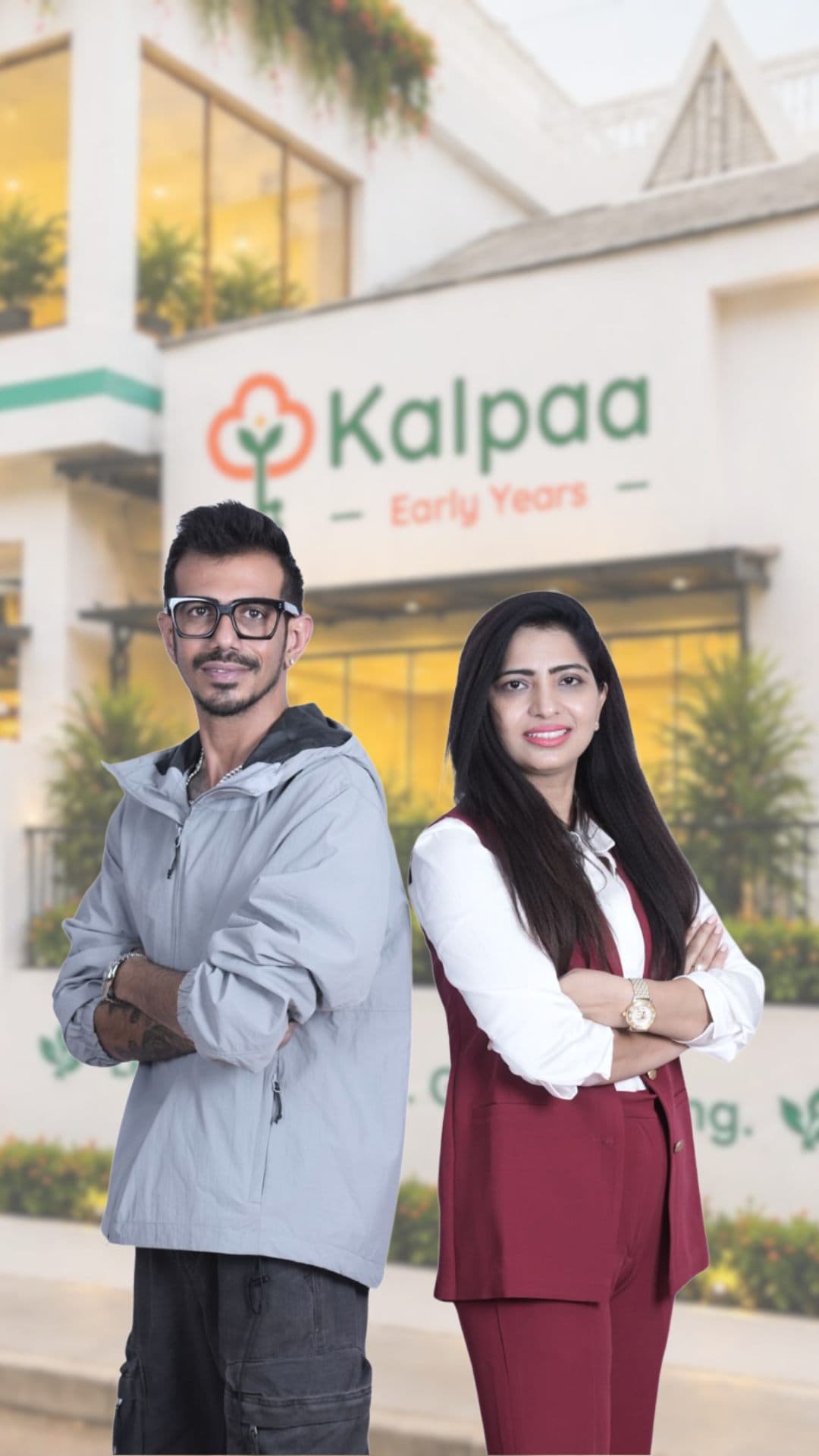 Yuzvendra Chahal and a colleague standing arms crossed outside a Kalpaa Early Years centre