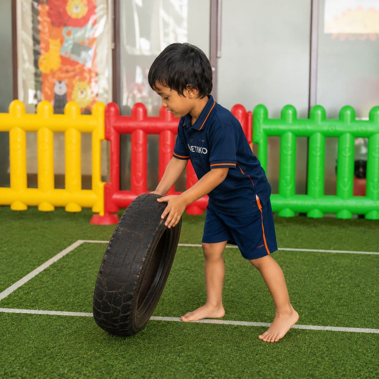 A Kalpaa child working through a Kinetiko agility course